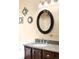 Close up of bathroom vanity showcasing granite counters and dark wood cabinets at 8879 Apache Plume Dr, Parker, CO 80134