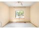 Bedroom showcasing ceiling fan and window offering natural light at 8879 Apache Plume Dr, Parker, CO 80134