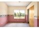 Bedroom featuring window overlooking landscaped yard at 8879 Apache Plume Dr, Parker, CO 80134