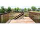 Wood deck overlooking open space and other homes at 8879 Apache Plume Dr, Parker, CO 80134