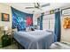 Bedroom with a large window and Star Wars decorations at 23469 E Briarwood Pl, Aurora, CO 80016