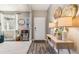 Charming entryway with modern decor, stylish console table, and plenty of natural light at 23469 E Briarwood Pl, Aurora, CO 80016