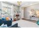 Comfortable living room with a white rug, stylish decor, and plenty of natural light at 23469 E Briarwood Pl, Aurora, CO 80016