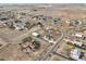 Aerial view showcases the location of the home in a large residential neighborhood at 16665 Kenuil St, Brighton, CO 80603