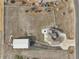 Bird's eye view of the property, outbuilding, pool, and large lot, ideal for outdoor activities at 16665 Kenuil St, Brighton, CO 80603