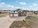 Gorgeous home featuring a three car garage and lush green yard at 16665 Kenuil St, Brighton, CO 80603