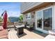 Relaxing outdoor deck area with comfortable seating and string lights, perfect for entertaining at 4997 Collinsville Pl, Highlands Ranch, CO 80130