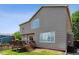 Back exterior view featuring a wooden deck and backyard, offering a cozy outdoor space at 4997 Collinsville Pl, Highlands Ranch, CO 80130