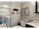 Well-decorated powder room with decorative accents and a modern sink at 4997 Collinsville Pl, Highlands Ranch, CO 80130