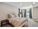 Cozy bedroom with lots of natural light, neutral carpet, and comfortable pillows at 4997 Collinsville Pl, Highlands Ranch, CO 80130