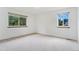 Bright bedroom with two windows that allow plenty of natural light at 72 S Nome St, Aurora, CO 80012