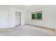 Light-filled bedroom with closet and large window at 72 S Nome St, Aurora, CO 80012