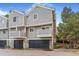 Charming townhome featuring a two-story layout, private garage, and quaint balcony at 72 S Nome St, Aurora, CO 80012