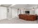 This finished basement features seating, closets, and speakers at 10212 Kelliwood Way, Highlands Ranch, CO 80126