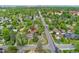 A serene, tree-lined street leads to this charming home, perfectly situated amidst the beauty of a verdant neighborhood at 1691 Roslyn St, Denver, CO 80220