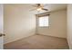 Neutral bedroom featuring neutral walls, neutral carpet and ceiling fan at 13313 Elizabeth St, Thornton, CO 80241