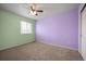 Bedroom with colorful walls, carpet, ceiling fan and window at 13313 Elizabeth St, Thornton, CO 80241