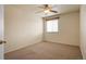 Cozy bedroom with a ceiling fan and a large window, perfect for a restful night's sleep at 13313 Elizabeth St, Thornton, CO 80241