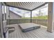 Outdoor deck featuring patio cover and hot tub at 7167 Hyland Hills St, Castle Pines, CO 80108