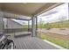 Outdoor deck space featuring hot tub, patio cover, wooden deck and backyard views at 7167 Hyland Hills St, Castle Pines, CO 80108