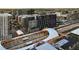 Aerial view of a modern building near public transportation, showcasing urban connectivity at 1750 Wewatta St # 1720, Denver, CO 80202