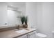 Modern bathroom with a sleek vanity, stylish mirror, and a clean, minimalist design at 1750 Wewatta St # 1720, Denver, CO 80202