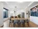 Open concept living space boasts a modern kitchen and a stylish dining area, perfect for entertaining at 1750 Wewatta St # 1720, Denver, CO 80202