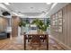 Bright dining room features a large wooden table, big windows, and a decorative rug at 1750 Wewatta St # 1720, Denver, CO 80202