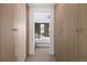 Bedroom view from a walk-in closet featuring built-in light wood cabinetry at 1750 Wewatta St # 1720, Denver, CO 80202
