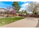 The wooden deck offers an excellent view of the backyard and provides ample space for outdoor gatherings at 5079 Morning Glory Pl, Highlands Ranch, CO 80130
