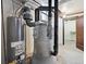 Basement featuring utilities and door to the next room that allows for extra storage at 386 Colorado Blvd, Denver, CO 80206