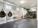 Spacious laundry room with modern washer and dryer, utility sink, and ample storage space, designed for convenience at 386 Colorado Blvd, Denver, CO 80206