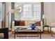 Cozy living area with large windows, comfortable seating, and elegant decor at 386 Colorado Blvd, Denver, CO 80206
