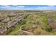 This is an aerial view of the neighborhood with green spaces, walking trails and houses at 7829 S Coolidge Way, Aurora, CO 80016