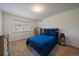 Bedroom with carpet, a bed, and a large window at 7829 S Coolidge Way, Aurora, CO 80016