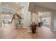Inviting foyer with hardwood floors, staircase, and elegant decor creating a grand entrance at 7829 S Coolidge Way, Aurora, CO 80016