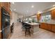 Open kitchen layout with views into the living room is great for entertaining at 7829 S Coolidge Way, Aurora, CO 80016