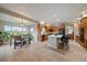 Eat-in kitchen with island and stainless-steel appliances is a culinary dream at 7829 S Coolidge Way, Aurora, CO 80016