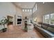 Spacious living room features a fireplace, large windows, and plenty of natural light at 7829 S Coolidge Way, Aurora, CO 80016