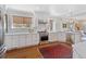 Spacious kitchen with stainless appliances, granite countertops, and ample cabinet space at 3811 E 26Th Avenue Pkwy, Denver, CO 80205