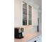 Elegant kitchen detail with glass front cabinets and modern coffee maker on display at 3811 E 26Th Avenue Pkwy, Denver, CO 80205