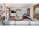 Inviting living room with cozy seating, a decorative fireplace, and hardwood floors creating a warm atmosphere at 3811 E 26Th Avenue Pkwy, Denver, CO 80205