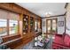 Elegant living room boasting built-in shelves, French doors, and comfortable seating at 3811 E 26Th Avenue Pkwy, Denver, CO 80205