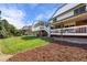Large backyard with well maintained lawn featuring multiple deck areas for entertainment and relaxing at 7629 S Fillmore Way, Centennial, CO 80122