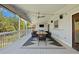 This inviting outdoor deck offers ample space for dining and relaxation, complete with stylish furniture and lighting at 7629 S Fillmore Way, Centennial, CO 80122