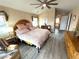 Vaulted bedroom featuring an ensuite bathroom and unique decor at 227 Powderhorn Trl, Broomfield, CO 80020