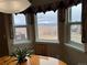 Cozy dining area featuring natural lighting and scenic views at 227 Powderhorn Trl, Broomfield, CO 80020