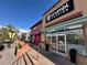 Storefront view of Crumbl Cookies retail bakery with brick facade and welcoming glass door at 14497 E 1St Dr # B3, Aurora, CO 80011