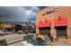 An inviting Panda Express restaurant with a brick facade, red awnings, and outdoor seating area at 14497 E 1St Dr # B3, Aurora, CO 80011