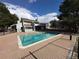 A pristine swimming pool with inviting clear water, set against the backdrop of a well-maintained condo complex at 14497 E 1St Dr # B3, Aurora, CO 80011